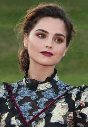 Jenna Coleman In Elegant Attire Wallpaper