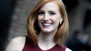 Jessica Chastain Striking A Pose Wallpaper