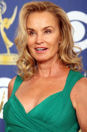 Jessica Lange In Sexy Green Outfit Wallpaper