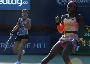 Jessica Pegula And Coco Gauff Fist Pump Wallpaper