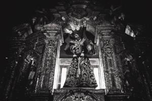 Jesus On Cross Statue In Church Wallpaper