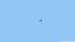 Jet Plane In Plain Blue Wallpaper