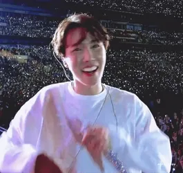 Jhope From Bts Shares A Captivating Smiley Portrait Wallpaper