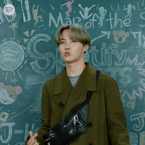 Jhope Radiating Positive Energy On Stage Wallpaper