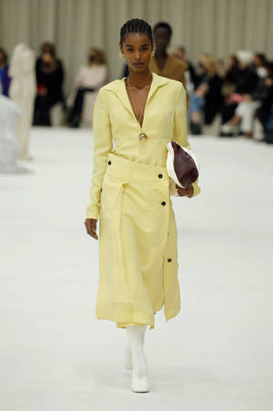 Jil Sander Yellow Long Coat Wallpaper