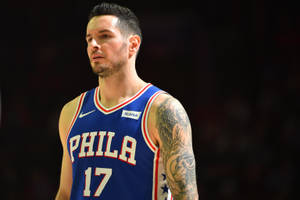 Jj Redick In A Dark Scene Wallpaper