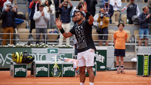 Jo-wilfried Tsonga, Celebrating His Triumph In Tennis Wallpaper