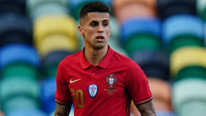 Joao Cancelo Looks At Something Wallpaper