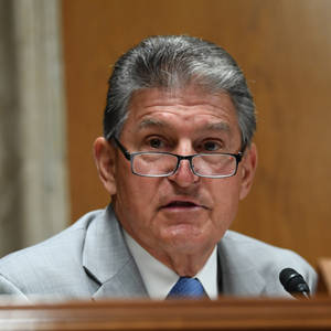 Joe Manchin And His Square Glasses Wallpaper