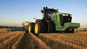 John Deere Machine With Large Tires Wallpaper