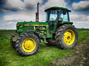 John Deere Tractor On Grass Wallpaper