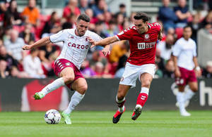John Mcginn In Action For Aston Villa Fc. Wallpaper