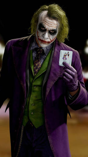 Joker Iphone With His Card Wallpaper