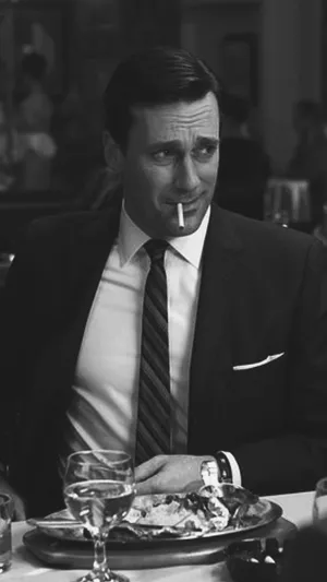 Jon Hamm Exudes Elegance In A Classic Men's Suit Wallpaper