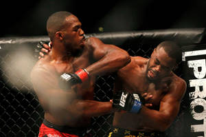 Jon Jones In Mma Action Wallpaper