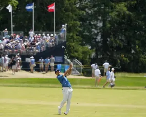 Jon Rahm With His Golf Club Wallpaper