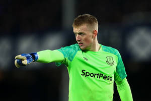 Jordan Pickford In Bright Neon Green Wallpaper