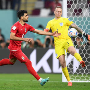 Jordan Pickford Stealing Ball From Opponent Wallpaper