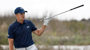 Jordan Spieth A Holding Golf Club Wallpaper