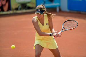 Julia Goerges About To Hit Ball Wallpaper