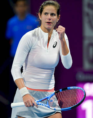 Julia Goerges Celebrates Victory On Court Wallpaper