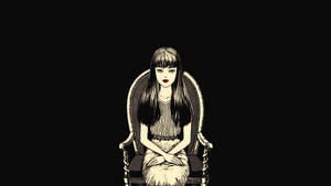 Junji Ito's Character Tomie Kawakami Lounging On A Chair Wallpaper