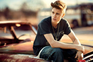 Justin Bieber On Vintage Car Wallpaper