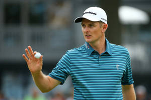 Justin Rose Holding Golf Ball Wallpaper