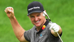 Justin Rose Raising Right Fist In Triumph Wallpaper