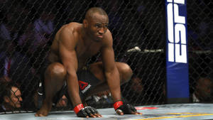 Kamaru Usman Palms On Ground Wallpaper