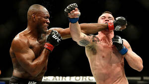 Kamaru Usman Punch Mouth Wallpaper