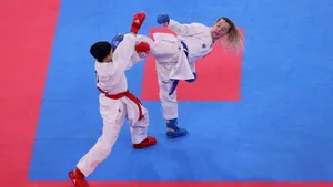 Karate Kick Fight On Mat Wallpaper