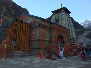 Kedarnath Temple Orange Marigold 4k Wallpaper