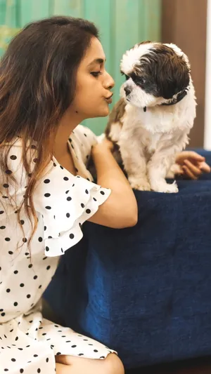 Keerthi Suresh And Pet Dog Wallpaper