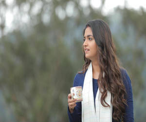 Keerthi Suresh Holding Teacup Hd Wallpaper