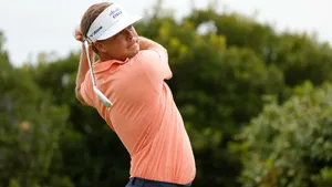 Keith Mitchell Wearing Peach Wallpaper
