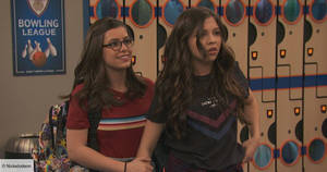 Kenzie Holding Babe Game Shakers Wallpaper