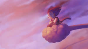 Kid Goku Flying Through The Air Wallpaper