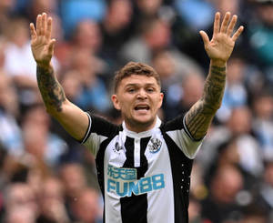 Kieran Trippier Arms Up Wallpaper