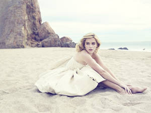 Kiernan Shipka In Beach Wallpaper