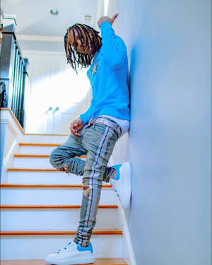 King Von On Stairs Wallpaper