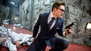 Kingsman The Secret Service Eggsy In A Suit Wallpaper