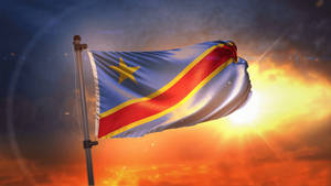 Kinshasa Flag And Sun Wallpaper