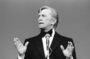 Kirk Douglas Speaking At The Cannes Film Festival Wallpaper