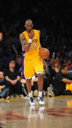Kobe Bryant Basketball Walking On Court Wallpaper