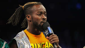 Kofi Kingston Holding A Microphone Wallpaper