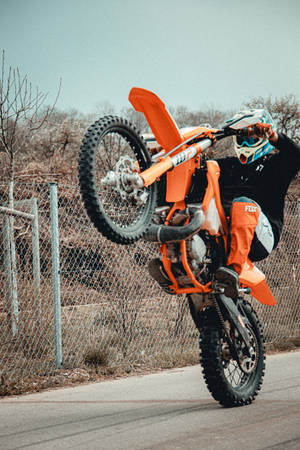 Ktm Bike During Wheelie Wallpaper