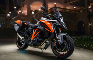 Ktm Duke 200 Near A House Wallpaper