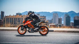 Ktm Duke 390 At Townscape Background Wallpaper