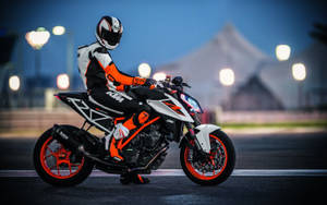 Ktm Duke 390 Rider In Full Gear Wallpaper